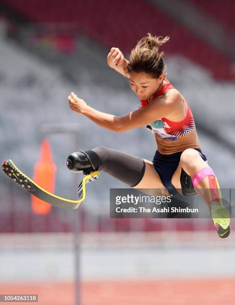 Maya Nakanishi of Japan competes in the Women's Long Jump T42-44/61-64 at the GBK Main Stadium on day three of the Asian Para Games on October 9,...