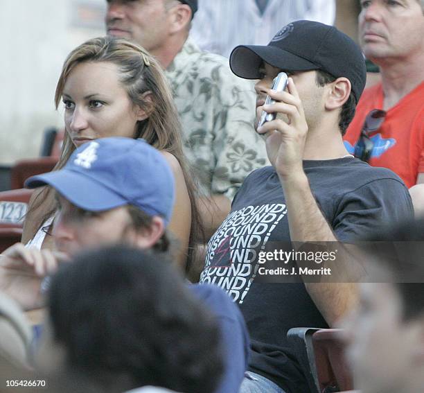 Jesse Metcalfe and guest during The 106.7 KROQ "Weenie Roast" Concert 2005 - Backstage at Verizon Wireless Amphitheatre in Irvine, California, United...