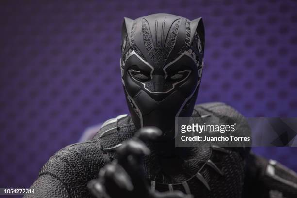 Fan dressed as Black Panther from Marvel Studios poses during SOFA 2018 on October 12, 2018 in Bogota, Colombia. SOFA is one of the largest cosplay...