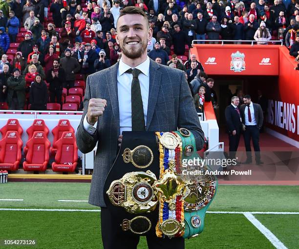 World Champion boxer Callum Smith at Anfield to show the people of Liverpool his belts at half time during the Premier League match between Liverpool...