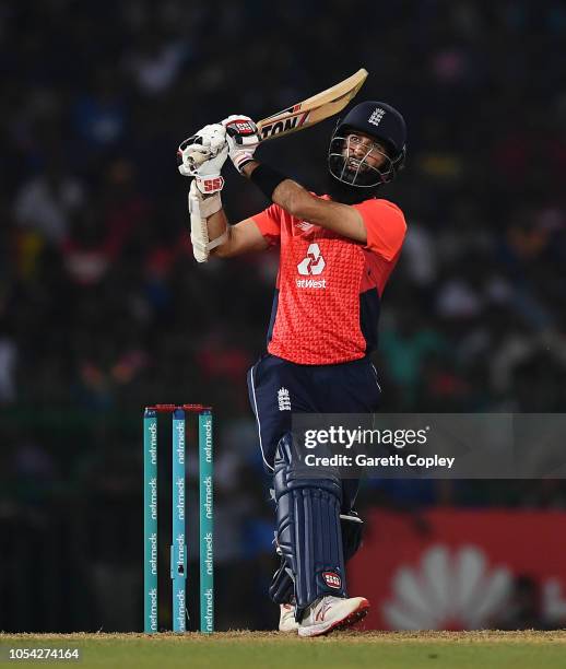 Moeen Ali of England hits out for six runs during the International Twenty20 match between Sri Lanka and England at R. Premadasa Stadium on October...