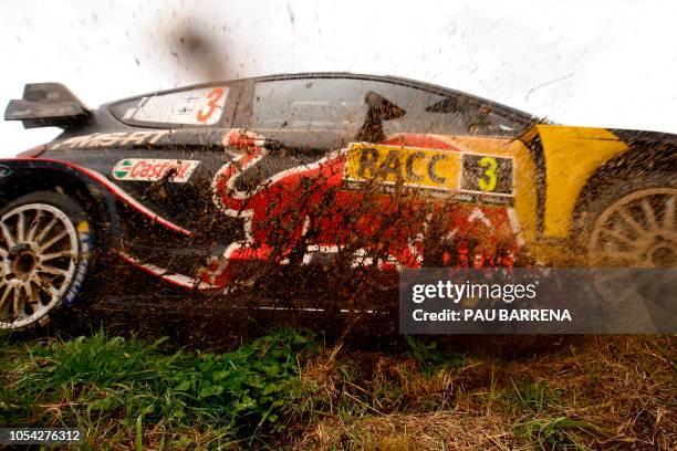 Finnish driver Teemu Suninen steers his Ford Fiesta WRC assisted by Finnish co-driver Mikko Markkula during the third day of the Catalonia 2018 FIA...