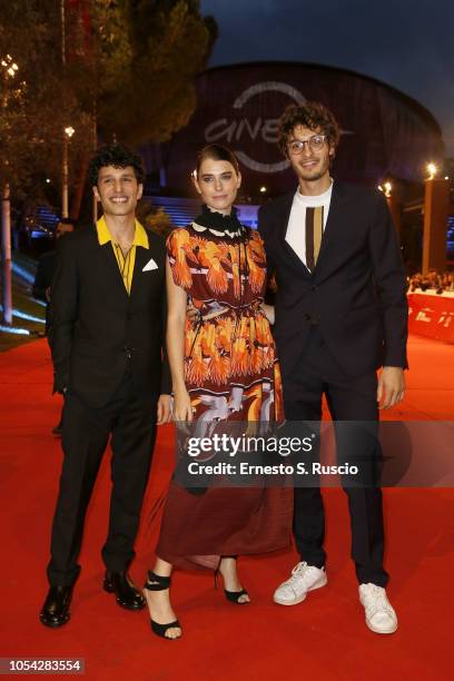 Mauro Lamantia, Irene Vetere and Giovanni Toscano walk the red carpet ahead of the "Notti Magiche" screening during the 13th Rome Film Fest at...