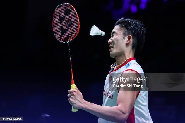 Kento Momota of Japan competes in the Men's Singles semi finals match against Chen Long of China on day five of the French Open at Stade Pierre de...