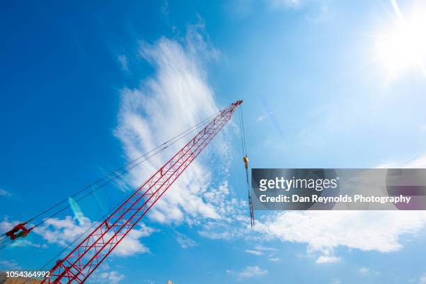 crane at highway construction site - bridging the gap concepts -heart stock pictures, royalty-free photos & images