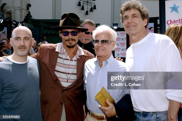 Jeff Robinov of Warner Bros., Johnny Depp, Richard D. Zanuck, producer of "Charlie and the Chocolate Factory" and Alan Horn of Warner Bros.