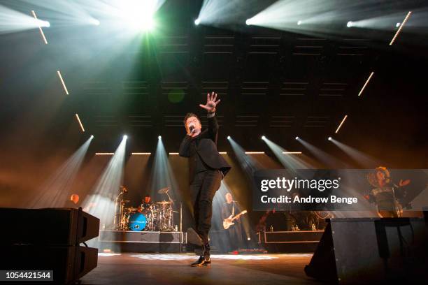 Rick Astley performs live on stage at Manchester Arena on October 27, 2018 in Manchester, England.