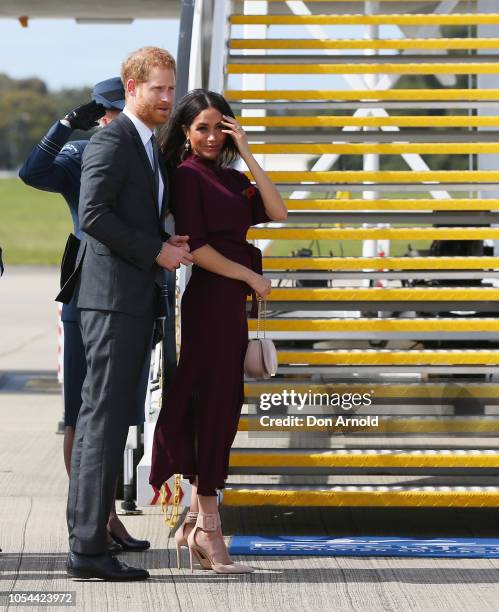 Prince Harry, Duke of Sussex and Meghan, Duchess of Sussex depart Sydney Airport on October 28, 2018 in Sydney, Australia. The Duke and Duchess of...
