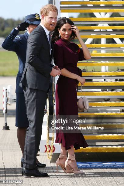 Prince Harry, Duke of Sussex and Meghan, Duchess of Sussex depart Sydney Airport on October 28, 2018 in Sydney, Australia. The Duke and Duchess of...