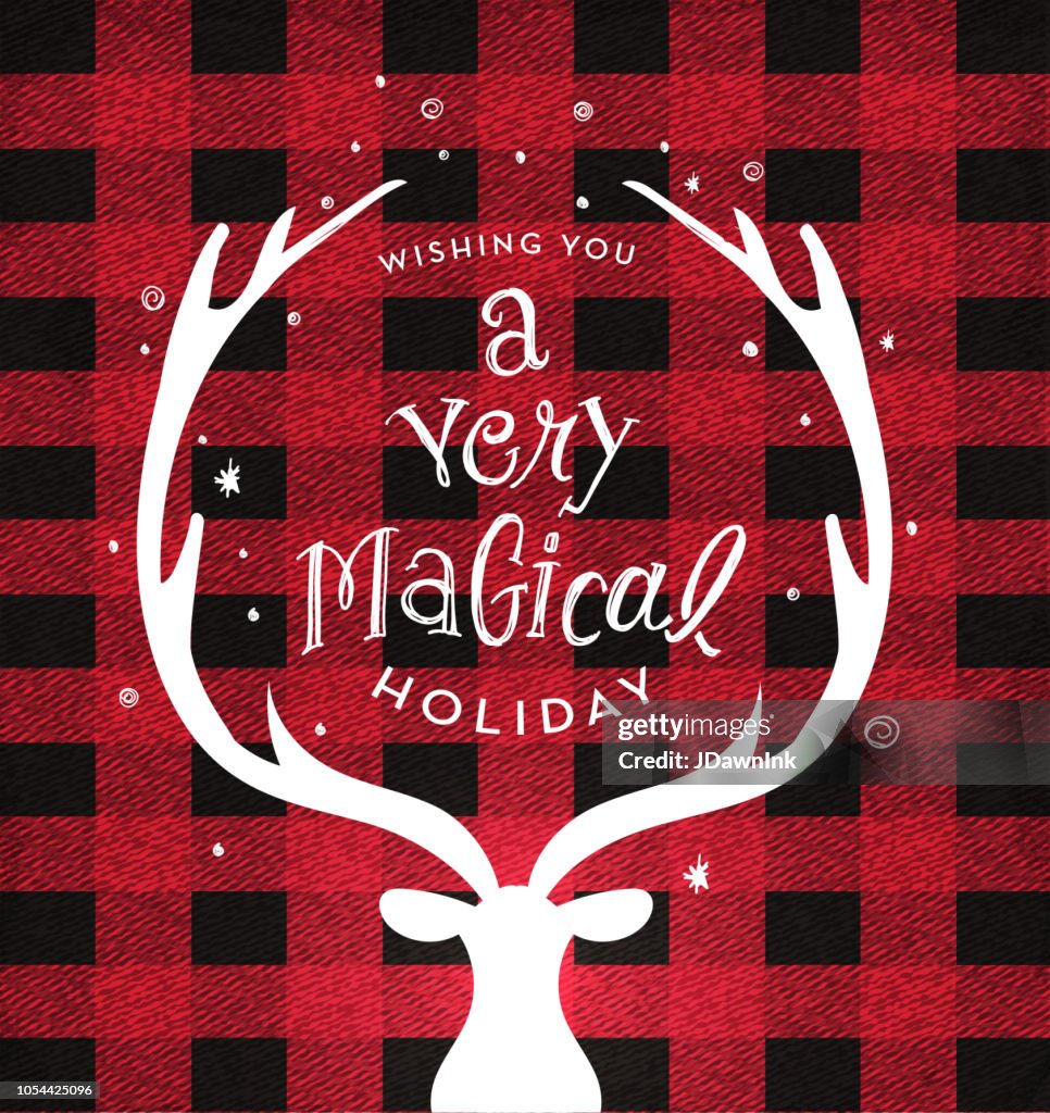 Christmas plaid background with deer head and antlers greeting design with hand drawn text