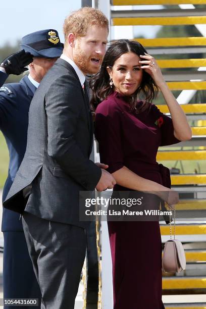 Prince Harry, Duke of Sussex and Meghan, Duchess of Sussex depart Sydney Airport on October 28, 2018 in Sydney, Australia. The Duke and Duchess of...