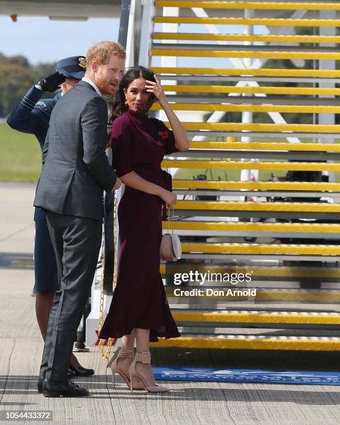 Prince Harry, Duke of Sussex and Meghan, Duchess of Sussex depart Sydney Airport on October 28, 2018 in Sydney, Australia. The Duke and Duchess of...