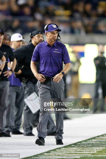 Head coach Chris Petersen of the Washington Huskies looks on from the sideline during the game against California Golden Bears at California Memorial...