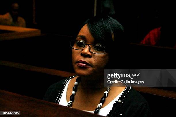 Sheryl Cwele, the wife of South African Minister of State Security, Siyabonga Cwel , sits in court on trial for trafficking cocaine, dealing drugs,...