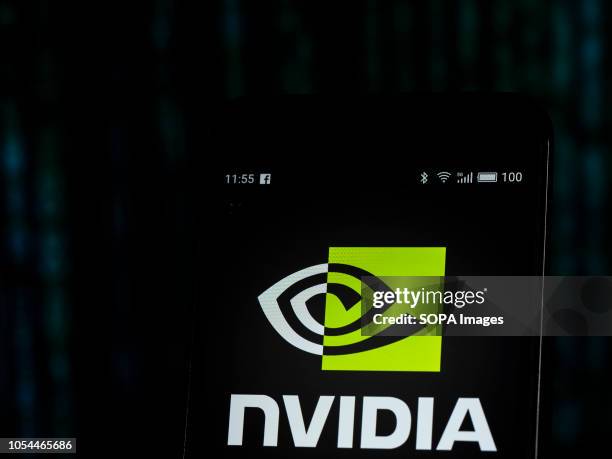 In this photo illustration, the Nvidia Corporation logo seen displayed on a smartphone. Nvidia Corporation is an American technology company. It...