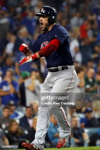 Steve Pearce of the Boston Red Sox reacts to hitting a game-tying solo home run in the eighth inning during Game 4 of the 2018 World Series against...