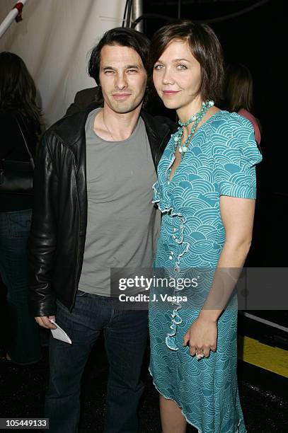 Olivier Martinez and Maggie Gyllenhaal during The 20th Annual IFP Independent Spirit Awards - Green Room in Santa Monica, California, United States.