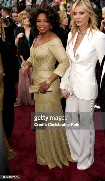Oprah Winfrey and Kimberly Hefner during The 77th Annual Academy Awards - Arrivals at Kodak Theatre in Los Angeles, California, United States.