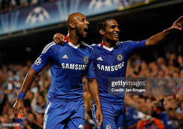 Nicolas Anelka of Chelsea celebrates his goal from the penalty spot with team-mate Florent Malouda during the UEFA Champions League Group F match...