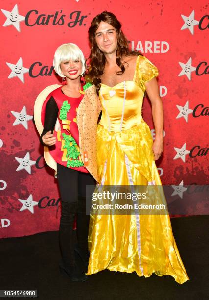 Sarah Hyland and Wells Adams attend Just Jared's 7th Annual Halloween Party at Goya Studios on October 27, 2018 in Los Angeles, California.