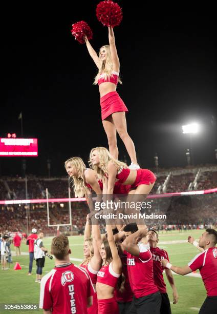 The University of Utah Cheerleading Team performs during an NCAA Pac-12 college football game between the Utah Utes and the Stanford Cardinal on...