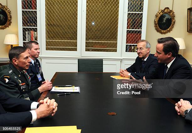 British Prime Minister David Cameron meets US General David Petraeus , NATO forces at 10 Downing Street on October 14, 2010 in London, England....