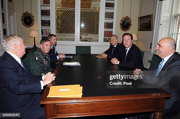 British Prime Minister David Cameron meets US General David Petraeus , NATO forces at 10 Downing Street on October 14, 2010 in London, England....