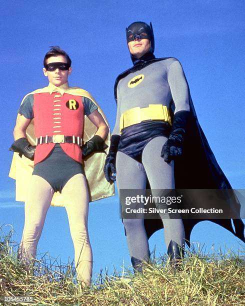 American actors Adam West as Bruce Wayne/Batman and Burt Ward as Dick Grayson/Robin in the TV series 'Batman', circa 1966.