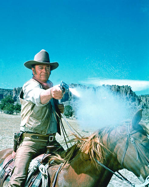 American actor John Wayne stars in the film 'The Undefeated', 1969.