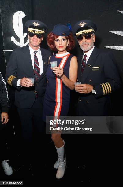 Rande Gerber, Cindy Crawford and George Clooney attend Casamigos & CATCH Halloween party at CATCH Las Vegas in ARIA Resort & Casino on October 27,...