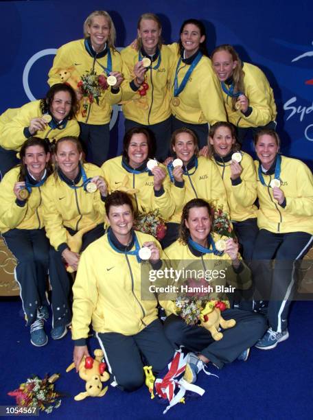The Australian team celebrate their Gold medal win, in the Women's Water Polo match between Australia and the USA, at the Sydney 2000 Olympic Games,...