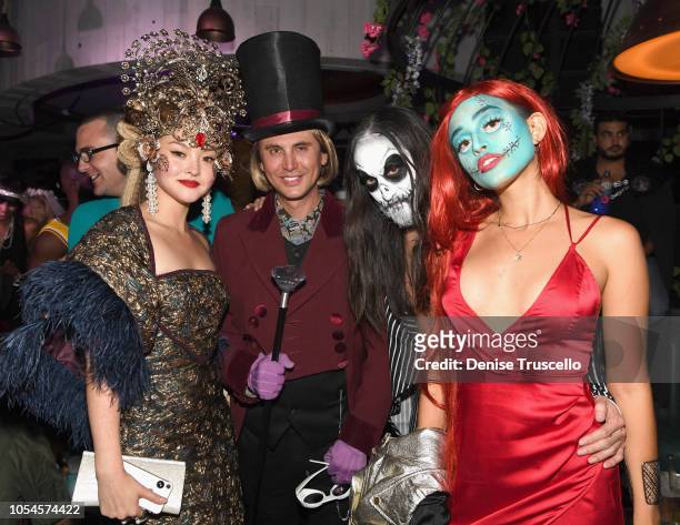 Devon Aoki, Jonathan Cheban, Steve Aoki and Nicole Zimmermann attend Casamigos Halloween party at CATCH Las Vegas at ARIA Resort & Casino on October...