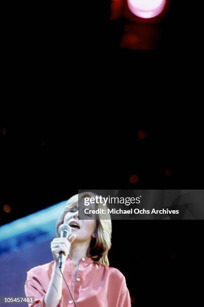 Singer Debby Boone rehearses her televised concert at KHJ Studios on December 17, 1977 in Los Angeles, California.