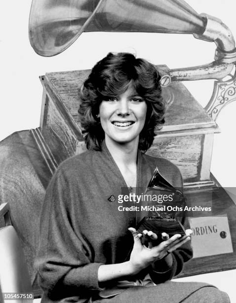 Singer Debby Boone poses with a Grammy Award circa 1979 in Los Angeles, California.