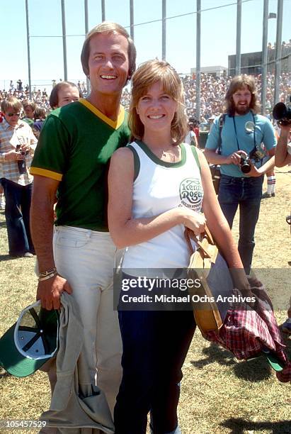 Singers Debby Boone and her father Pat Boone pose for a portrait during the Kenny Rogers Celebrity Softball Game to aid the Nevada Special Olympics...