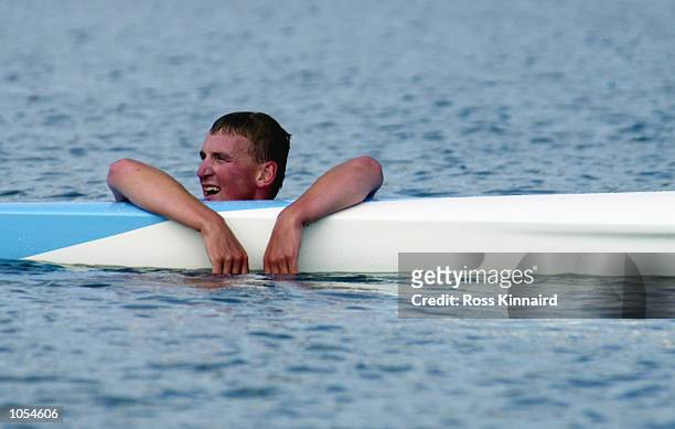 Matthew Pinsent of Great Britain in the water after winning gold in the Men's Coxless Four Rowing Final at the Sydney International Regatta on Day...