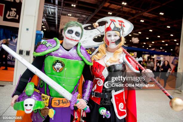 Cosplayer couple in character as Harley Quinn and The Joker Space Marines during Day 3 of MCM London Comic Con 2018 at ExCel on October 28, 2018 in...