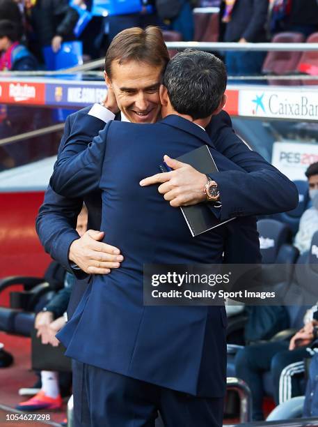 Manager Julen Lopetgui of Real Madrid embraces Manager Ernesto Valverde of Barcelona prior to the La Liga match between FC Barcelona and Real Madrid...