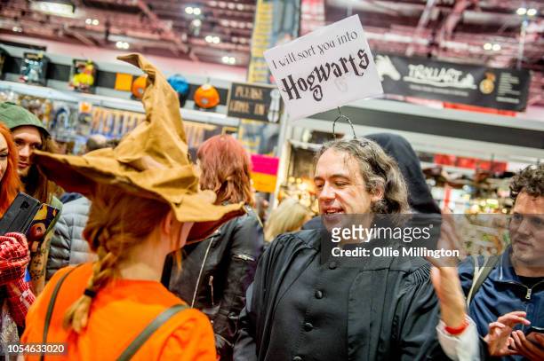 Harry Potter cosplayer seen sorting people into houses with the Sorting Hat during Day 3 of MCM London Comic Con 2018 at ExCel on October 28, 2018 in...