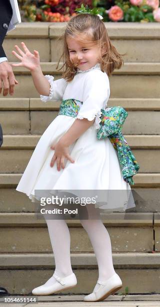 Princess Charlotte of Cambridge attends the wedding of Princess Eugenie of York and Jack Brooksbank at St George's Chapel on October 12, 2018 in...