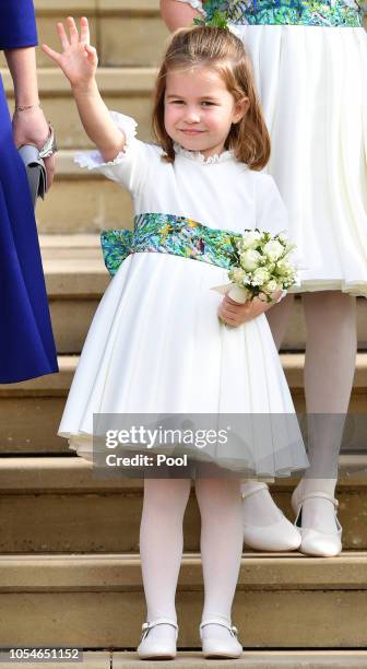 Princess Charlotte of Cambridge attends the wedding of Princess Eugenie of York and Jack Brooksbank at St George's Chapel on October 12, 2018 in...