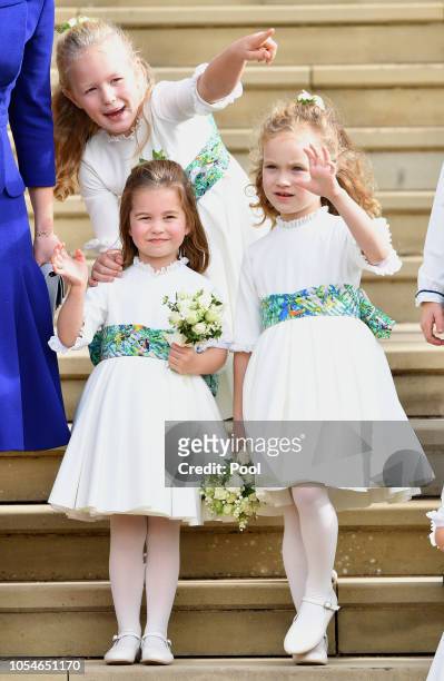 Savannah Phillips, Princess Charlotte of Cambridge and Maud Windsor attend the wedding of Princess Eugenie of York and Jack Brooksbank at St George's...