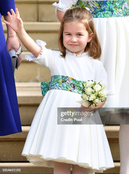 Princess Charlotte of Cambridge attends the wedding of Princess Eugenie of York and Jack Brooksbank at St George's Chapel on October 12, 2018 in...