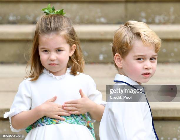 Princess Charlotte of Cambridge and Prince George of Cambridge attend the wedding of Princess Eugenie of York and Jack Brooksbank at St George's...