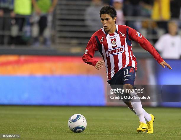 Ulises Davila of Chivas de Guadalajara dribbles against the Seattle Sounders FC on October 12, 2010 at Qwest Field in Seattle, Washington.