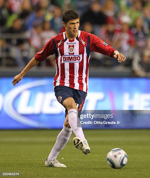 Jorge Enriquez of Chivas de Guadalajara passes the ball against the Seattle Sounders FC on October 12, 2010 at Qwest Field in Seattle, Washington.