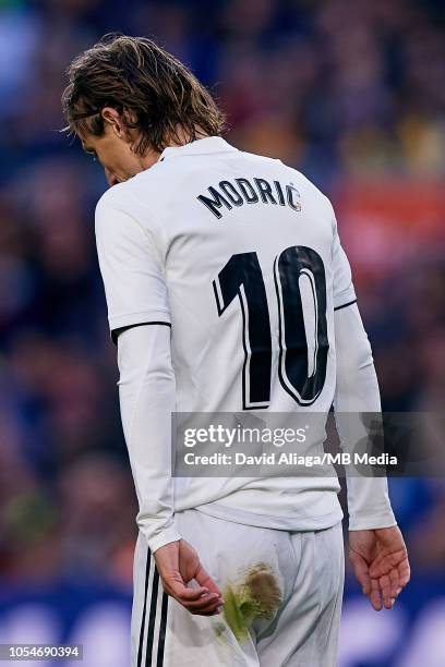 Luka Modric of Real Madrid CF looks on during the La Liga match between FC Barcelona and Real Madrid CF at Camp Nou on October 28, 2018 in Barcelona,...