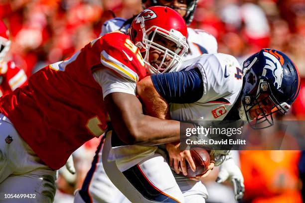 Chris Jones of the Kansas City Chiefs sacks Case Keenum of the Denver Broncos during the third quarter of the game at Arrowhead Stadium on October...