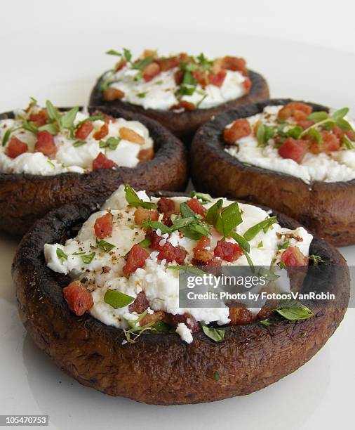 portobello with goats' cheese, bacon and thym - portobello mushroom stock pictures, royalty-free photos & images