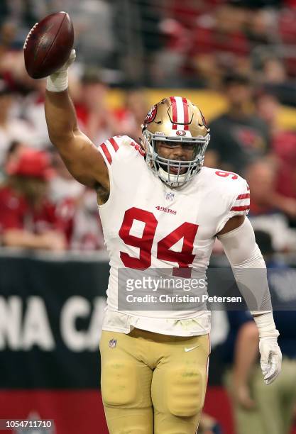 Defensive end Solomon Thomas of the San Francisco 49ers reacts after an intentional grounding penalty resulted in a safety during the first quarter...